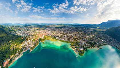 Annecy, France. Lake Annecy with surrounding mountains and villages. Panorama in summer. French Alps. Aerial view