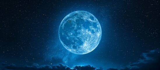 Dark sky with a full, blue moon.