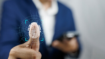 Businessman using fingerprint indentification for financial security Cybernetics and security....