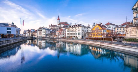 Deurstickers Town of Thun and Aare river reflection panoramic view © xbrchx
