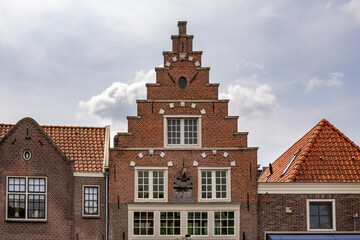 Fototapeta na wymiar Stepped gable facade of former Waag in old town Medemblik, Noord-Holland, Netherlands