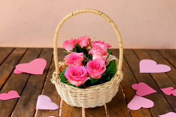 pink roses in a wicker basket