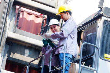 Employee working at shipping container.