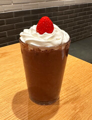 chocolate frappuccino with whipped cream and strawberry