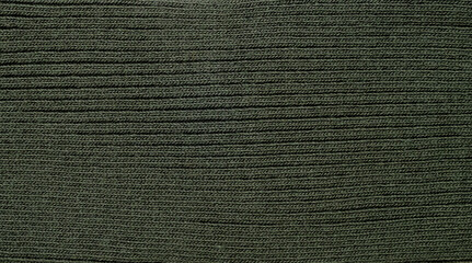 Dark green textile material background