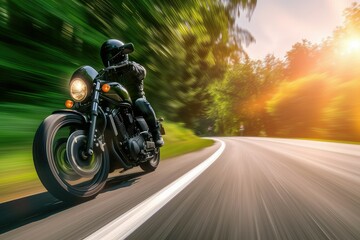 A motorcycle rider speeding on a road. - obrazy, fototapety, plakaty