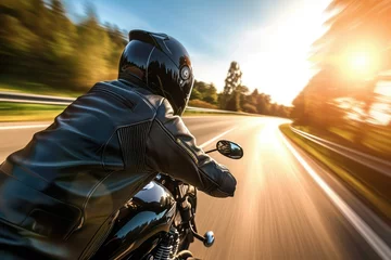Poster A motorcyclist speeds down the highway wearing a sleek crash helmet. © Suwanlee