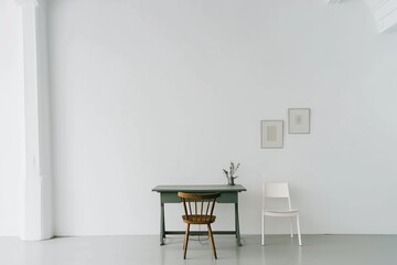 empty white room with chairs, a green table, and an empty wooden desk, in the style of minimalist
