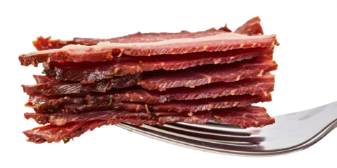 Fotobehang Close-up of a fork with a stack of thinly sliced pastrami, emphasizing the layers and marbling in the cured meat. isolated on white background. © Only PNG