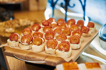 A set of beautiful snacks on the table. The buffet is on the table. Catering