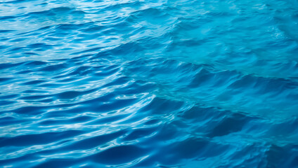 Fototapeta premium Blue wave background wallpaper, water ripples, natural drops, water splashes, beautiful realistic background of sea or ocean, nature concept.