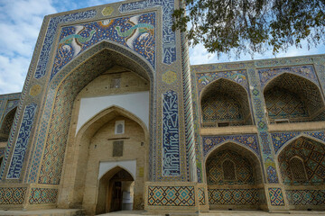 Fototapeta na wymiar Views of the Nodir Devonbegi Madrasah in the center of Bukhara in Uzbekistan.