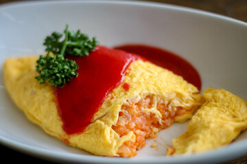 Omurice. Japanese omelette with rice.
