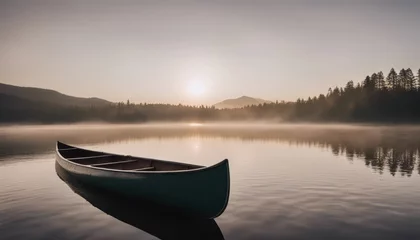 Rollo Bow of a canoe in the morning on a misty lake © Adi