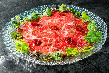 Beef carpaccio slice meat on plate