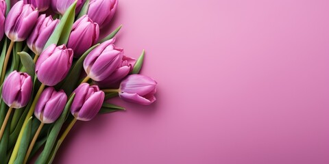 Bouquet of purple tulips on a pink background, top view, space for text. Generative AI