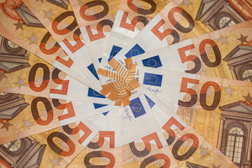 Fifty euro (EU) banknotes in the shape of a circle, official currency of Europe