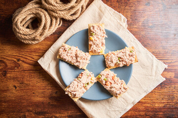 Classic tuna salad with soda crackers and mayonnaise
