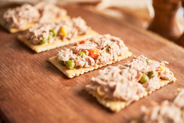 Classic tuna salad with soda crackers and mayonnaise