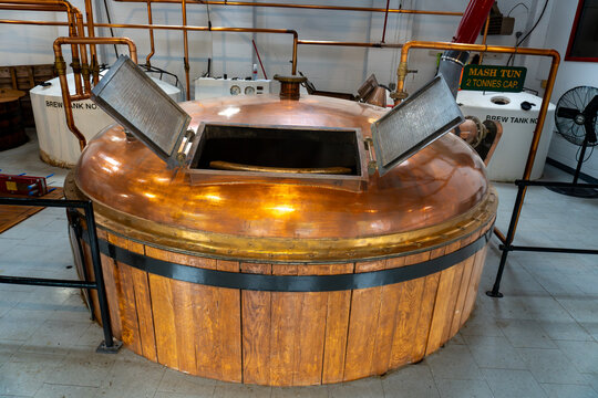 Whisky distillery. Large tank called mash tun or tub for fermentation, agitating, mashing.
