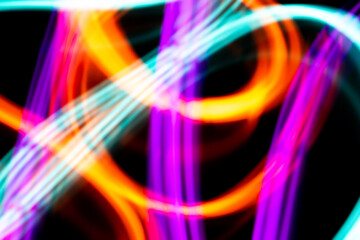 Abstract Neon Lights on Black Background Blurred and Moving 80s Vibe Disco