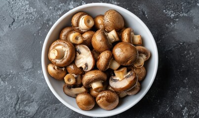Canned sliced button mushrooms in a white ceramic bowl isolated on white.Generative AI