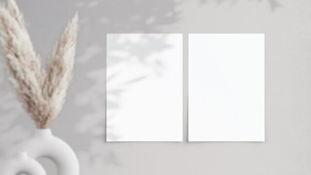 Two vertical posters A ISO Video Mockup in home interior, Shadow Motion Mockup