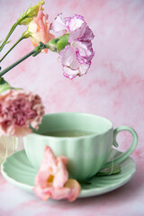 Fototapeta na wymiar cup of tea and flowers