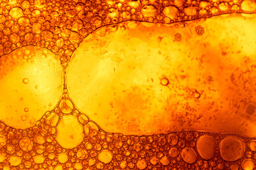 Beer bubbles surface, macro close-up,Cooled glass of beer close-up. Small water drops on cold...