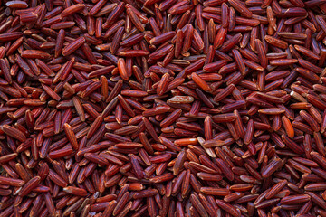 Macro black rice seeds,Close up background view of organic black purple rice