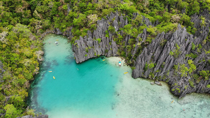 Karst mountains aerial view and blue lagoon