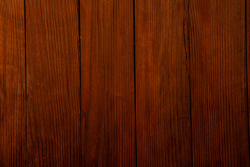 Fototapeta premium Vintage brown wood background texture with knots and nail holes. Old painted wood wall. Brown abstract background. Vintage wooden dark horizontal boards. Front view with copy space