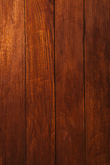 Vintage brown wood background texture with knots and nail holes. Old painted wood wall. Brown abstract background. Vintage wooden dark horizontal boards. Front view with copy space