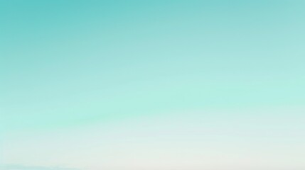 Fototapeta premium Abstract color gradient background in cool blue, icy blue, and refreshing mint green transitioning into crisp white