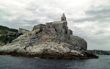 Landscape of Portovenere with the Doria castle and the church of San Pietro as seen from the sea....