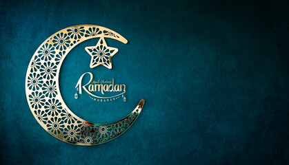 Golden Crescent moon shape isolated on green colour background with Ramadan greeting text