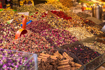 Close-up of colorful herbal tea at the bazaar, selective focus. Various types of tea and spices at...