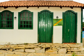 Colonial house door and windows in Corumbá de Goiás. This city was founded in 1730 by the...