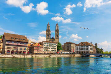 Grossm nster Romanesque Protestant church and Zurich promenade, Switzerland - obrazy, fototapety, plakaty