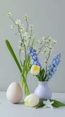 Obraz na płótnie Canvas spring bouquet of lilies of the valley, forget-me-nots, hyacinths, muscari, daffodils, composition of Easter eggs, minimalism, studio, modern product photo, holiday, place for text, symbol, religious