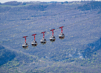 Gondola bubbles - Cable car taking tourists to Fort de La Bastille in Grenoble, France