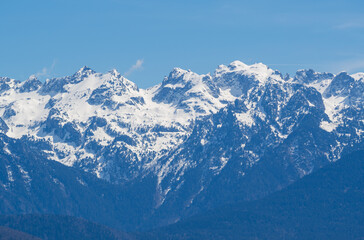 Fototapeta premium Blue morning sky over the French Alps mountains, Alpe d'Huez, France