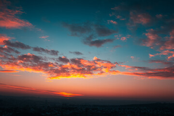 Beautiful landscape of colourful dark sunset or sunrise.