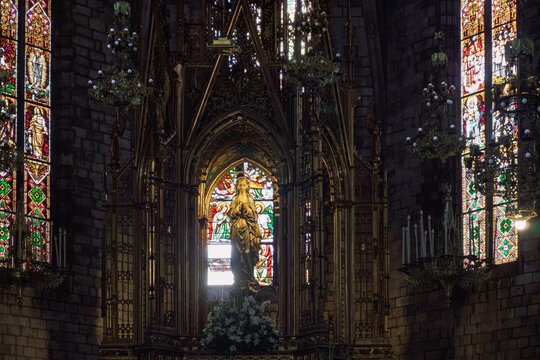 Christian church Basilica of the Immaculate Conception and Assumption of Our Lady - Basilica de la Purissima Concepcio - with religious statue in Barcelona, Catalonia Spain.