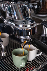 espresso machine filling two cups