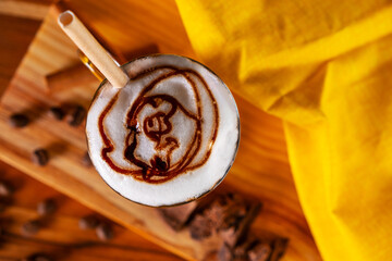 transparent mug with creamy cappuccino