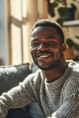 Sunny Portrait of a Joyful African American Man in a Living Room