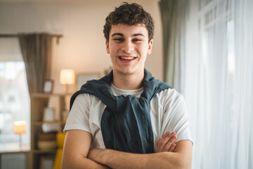 Portrait of teenage boy caucasian teen male young man stand at home