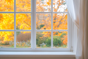 Naklejka premium White tall window sill with autumn garden on background