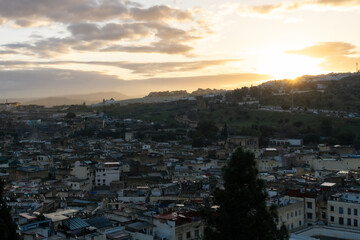 Fototapeta na wymiar view of the sunrise on a rooftop of Fes